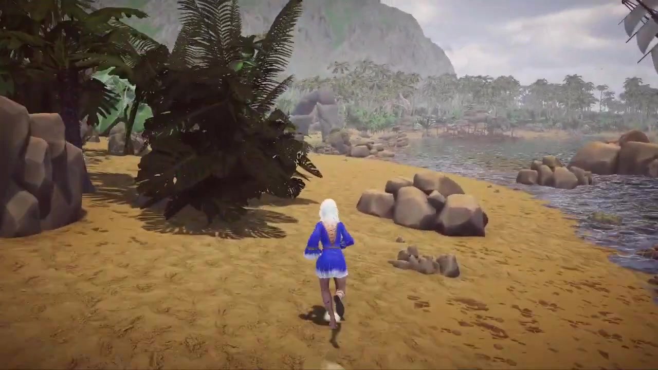 A sandy beach path with palm trees and water